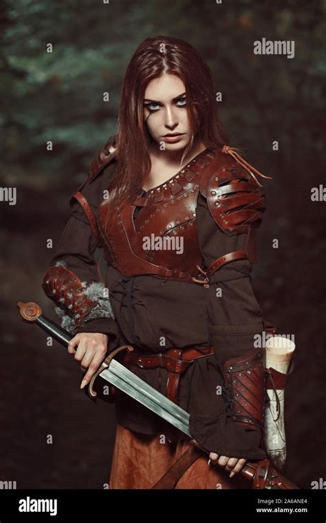 Beautiful Female Warrior With Leather Armor Stock Photo Alamy