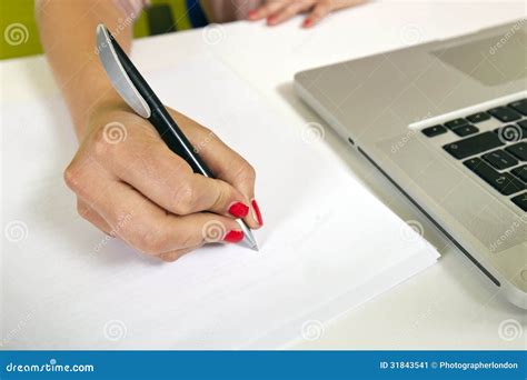 Close Up View Of Young Womans Hand Writing On Paper Stock Image Image
