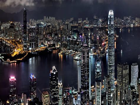 Flint took off after the criminal that penry, as he was called, engaged his transformation sequence. Asia-city Hong Kong in China, look at night-bay-boats, buildings, skyscrapers, night lights ...