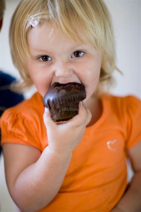 Girl Eating Chocolate Muffin Picture And Hd Photos Free Download On Lovepik