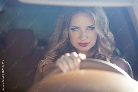 Beautiful Smiling Woman Driving Car Attractive Girl Sitting In Stock Photo Adobe Stock