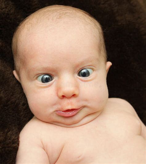 Funny Face Baby stock photo. Image of crosseyed, face - 27701492
