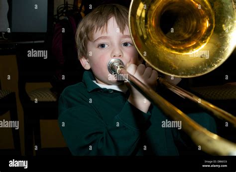 Boy Plays Trombone Stock Photo Alamy