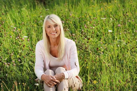 Mature Woman In Flower Field Stock Photo Image Of Middle Woman 85898934