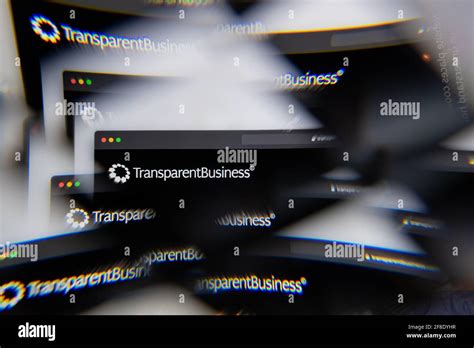 Milan Italy APRIL TransparentBusiness Logo On Laptop Screen Seen Through An Optical