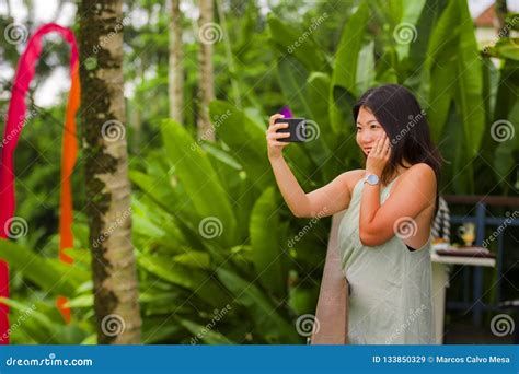 Young Happy And Attractive Asian Chinese Woman Taking Selfie Self