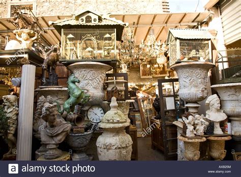 Antiques On Display In Flea Market At St Ouen Paris France Stock Photo