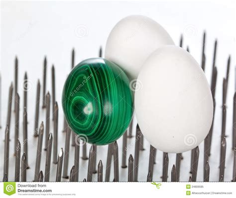 Two White Eggs And An Emerald Egg Stock Image Image Of Cracked Clean