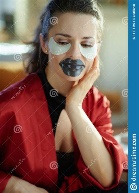 Modern 40 Years Old Housewife Using Lip Mask And Eye Patches Stock Image Image Of Flat