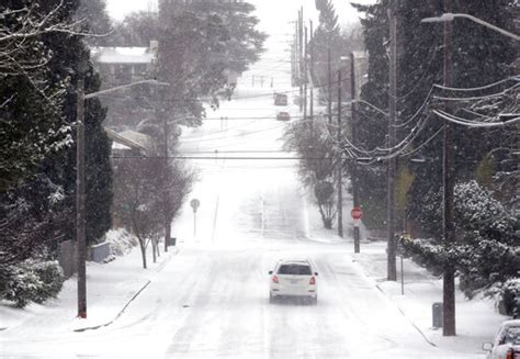 Winter Storm Dumps Rare Snow On Seattle As Midwest Warms
