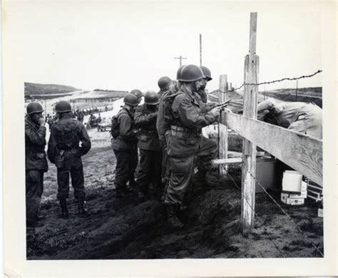 Trainees In Discussion At Fence At Fort Ord — Calisphere