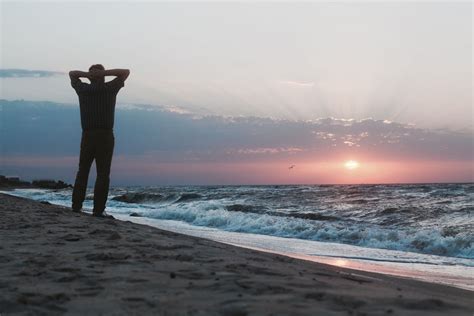 Man Watching The Sunrise On Beach Cowichan Craniosacral Maternity
