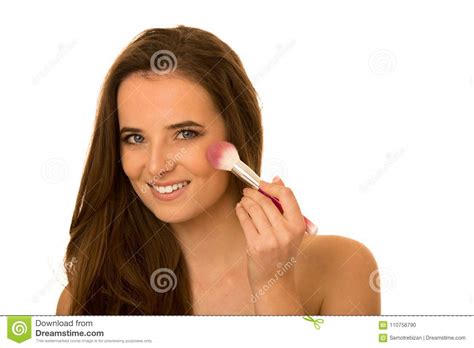 Beautiful Young Caucasian Brunette Woman Applying Makeup