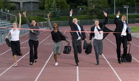 Business People Crossing The Finish Line Stock Image Image Of Runners