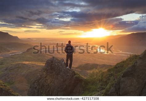 Man Standing On Ledge Mountain Enjoying Stock Photo Edit Now 427117108
