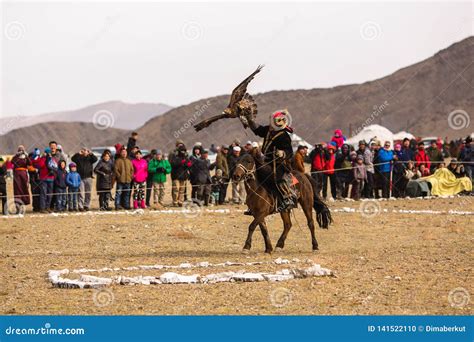 Berkutchi Kazakh Eagle Hunter In The Mountains Of Bayan Olgii Aimag Of