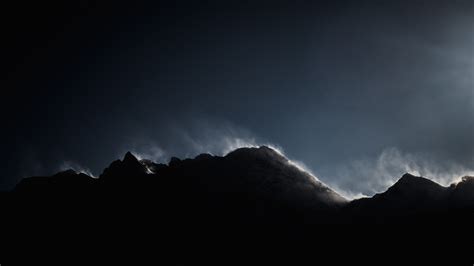 Download Wallpaper 1366x768 Dark Mountains Peak Fog Tablet Laptop