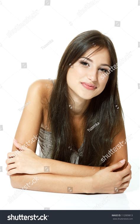 4 teen girls lying down, arm in arm, holding hands, chatting. Beautiful Teen Girl Lying Down Smiling Stock Photo ...