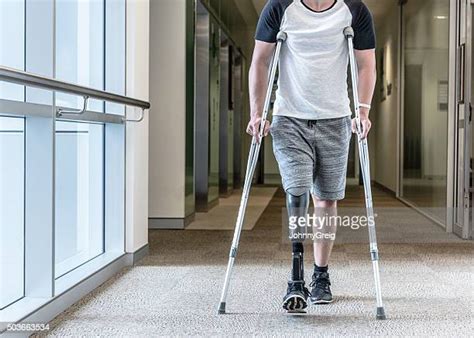 Amputee Crutches Photos And Premium High Res Pictures Getty Images