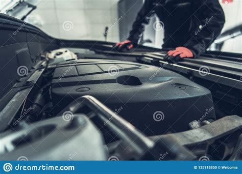 Induction ic card or coins recognizer. Car Mechanic Preparing For Job Stock Photo - Image of ...