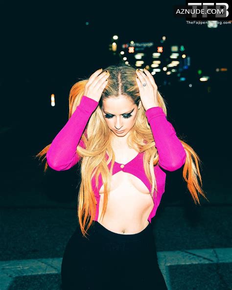 Avril Lavigne Sexy Poses Braless Showing Off Her Underboobs In A Pink