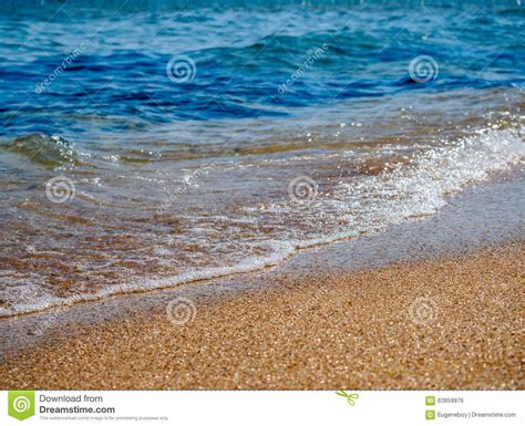 Blue Sea Waves On Yellow Sand Stock Photo Image Of Beach Yellow