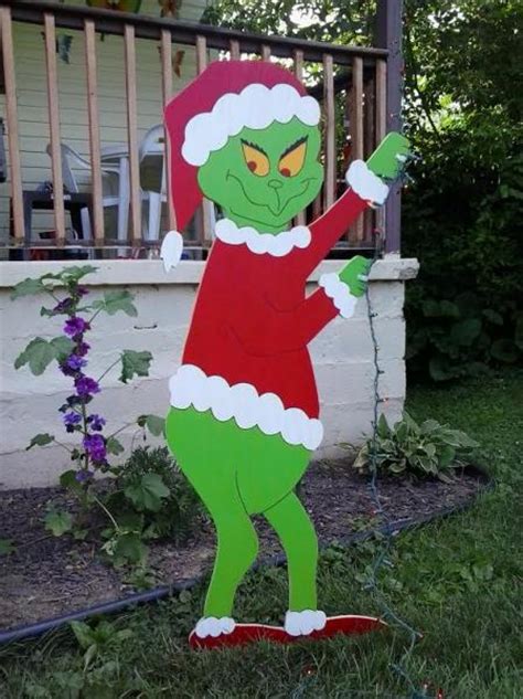 This indoor or outdor blow mold christmas decoration stands 31 tall, and includes the cord for lighting up those dark, wintery nights. Grinch Christmas Standing Grinch by MikesYardDisplays on ...