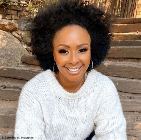 This most excellent men's curly hairstyle is worn without product. Boity Thulo showcases her natural hair