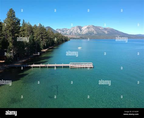 Aerial View Of Pier At Lake Tahoe Forest And Mountains Stock Photo Alamy