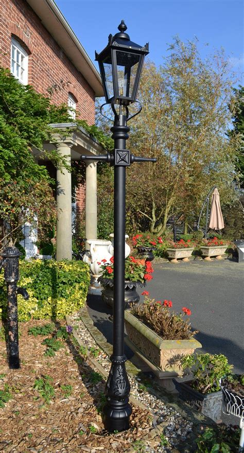 A Cast Iron Victorian Garden Lamp Post Set Manufactured By English