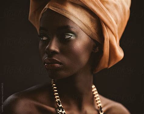 African Woman With An Orange Turban By Stocksy Contributor Lumina African Women Portrait