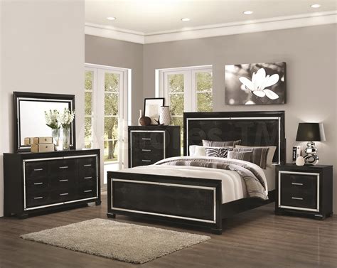 This option is charming and cozy when paired with pretty white lace curtains that adorn the windows. Black and mirrored bedroom furniture | Hawk Haven