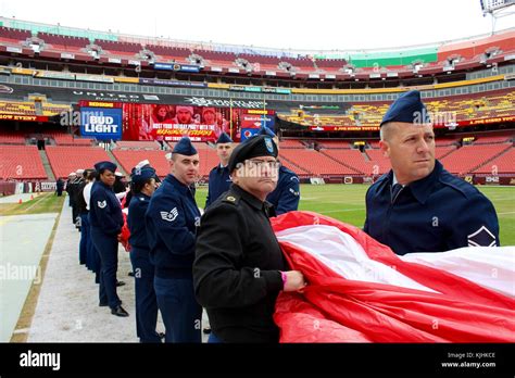 D.C.-area service members rehearse unveiling a field-length American