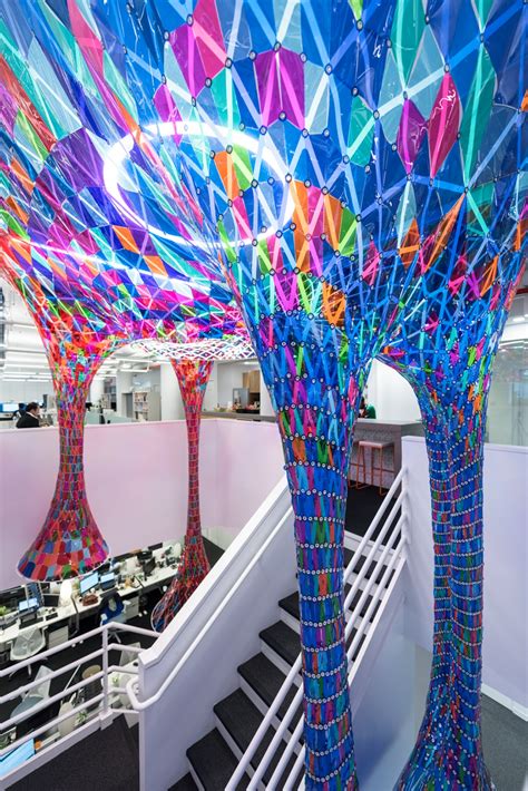 Stain glass art installation that hangs through two floors of Behance's new NYC offices ...