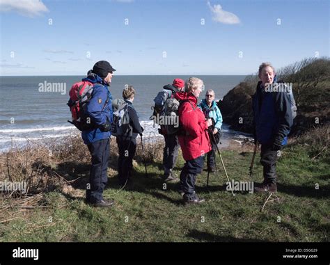 North Wales Walkers On The Isle Of Anglesey Coastal Path Suitabiliy