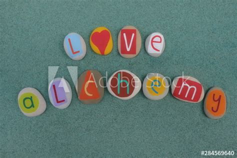 Love Alchemy Text Composed With Creative Carved And Colored Stones Over