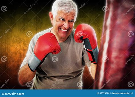 Composite Image Of Portrait Of A Determined Senior Boxer Stock Photo