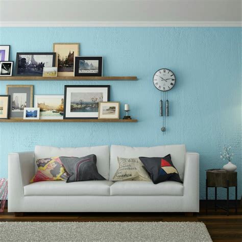 A Soothing Sky Blue Living Room With Beautiful Accents Blue Wall