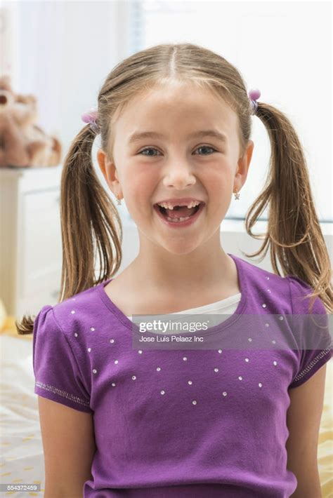 Caucasian Girl Smiling With Missing Teeth Bildbanksbilder Getty Images