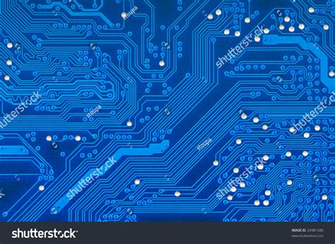 Detail Of Blue Printed Circuit Board With Silver Studs Stock Photo