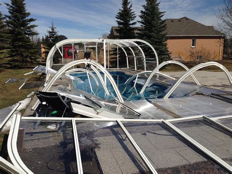 A retractable pool cover costs about $2,000, including the reel's cost. How Retractable Pool Enclosures Guarantee Extended ...