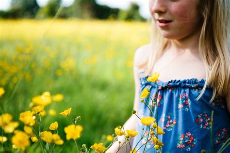 Buttercups And A Little Girl By Stocksy Contributor Helen Rushbrook