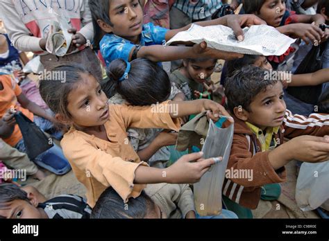 Poor Kids Getting Presents In Gujarat India Stock Photo Alamy
