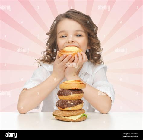 Little Girl Junk Food Hi Res Stock Photography And Images Alamy