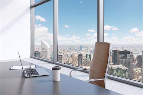Workplace In A Modern Panoramic Office With New York View Stock Photo
