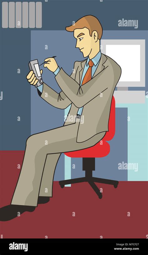 Businessman Sitting In An Office Using A Personal Data Assistant Hi Res