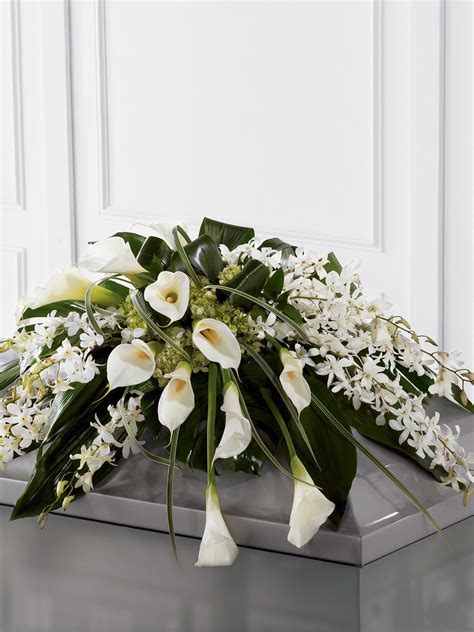 Calla Lily And Orchid Casket Spray Price And Stubbs Funeral Directors Stone