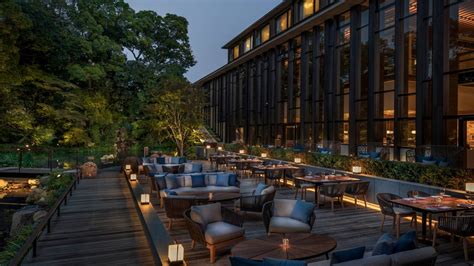 The Four Seasons Kyoto Luxury Hotel Centered Around An 800 Year Old Pond Garden Into Japan