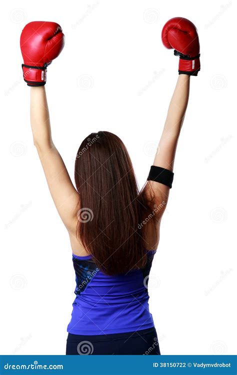 Back View Portrait Of A Young Woman Wearing Boxing Gloves Standing