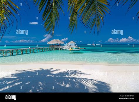 tropical beach with water bungalows on the maldives amazing shore coastline sea view with